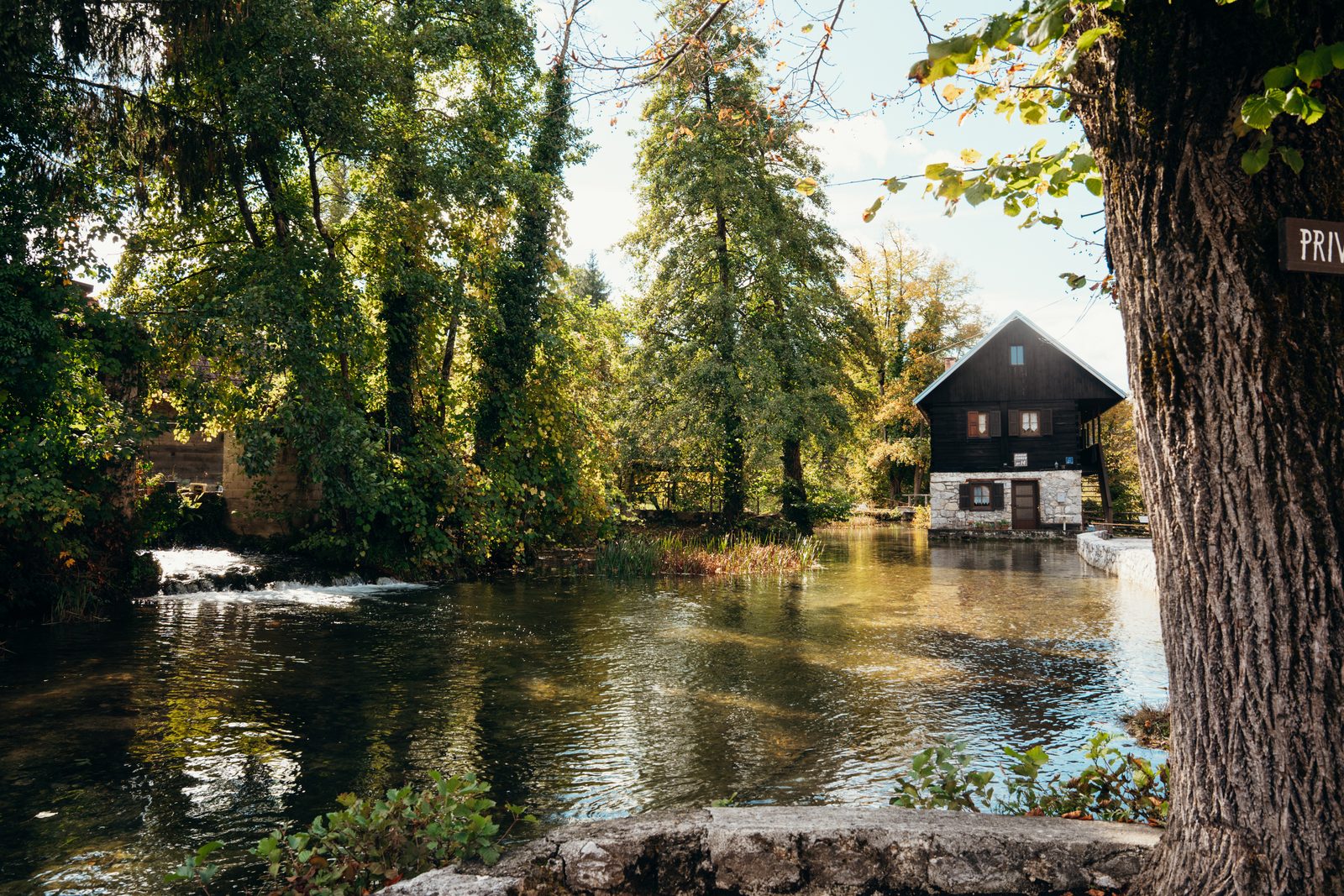 Wooden houses by the water.